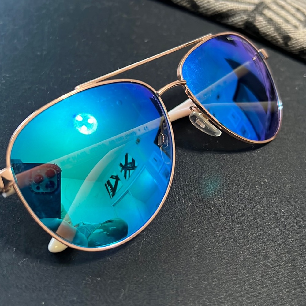 Michael Kors sunglasses, polarized with blue shield frames.